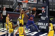 Turner attempting to block a shot.